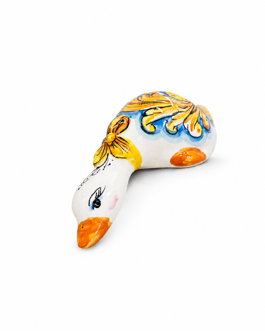 Hand-painted Sicilian ceramic duck sculpture in Mediterranean colors
Italian artisan ceramic animal decorative object
Mediterranean ceramic duck handcrafted in Sicily