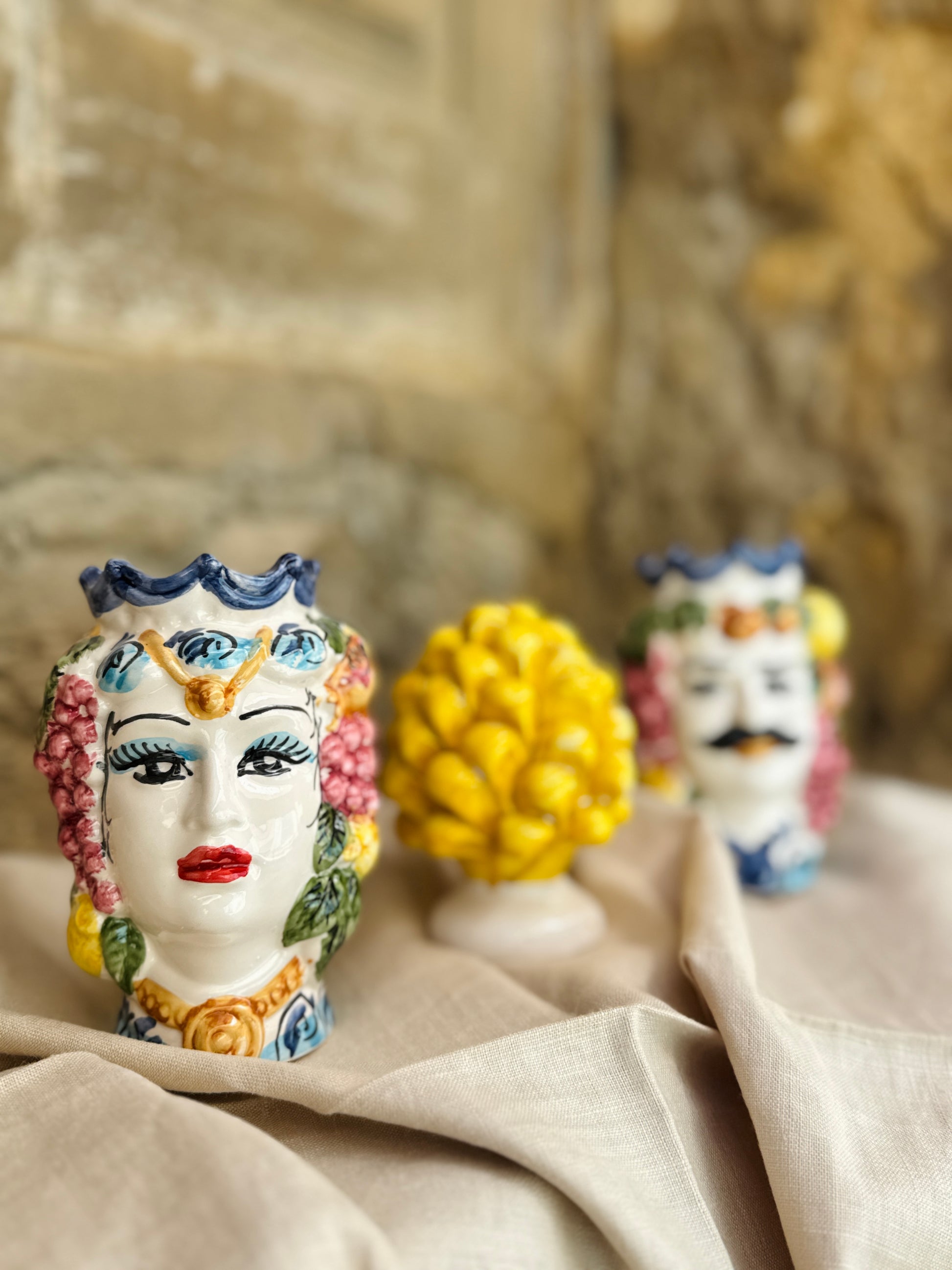 Handcrafted Sicilian ceramic composition with Teste di Moro and pigna
Mediterranean ceramic decorative set handcrafted in Sicily
Sicilian artisan ceramic sculptures with colorful baroque motifs