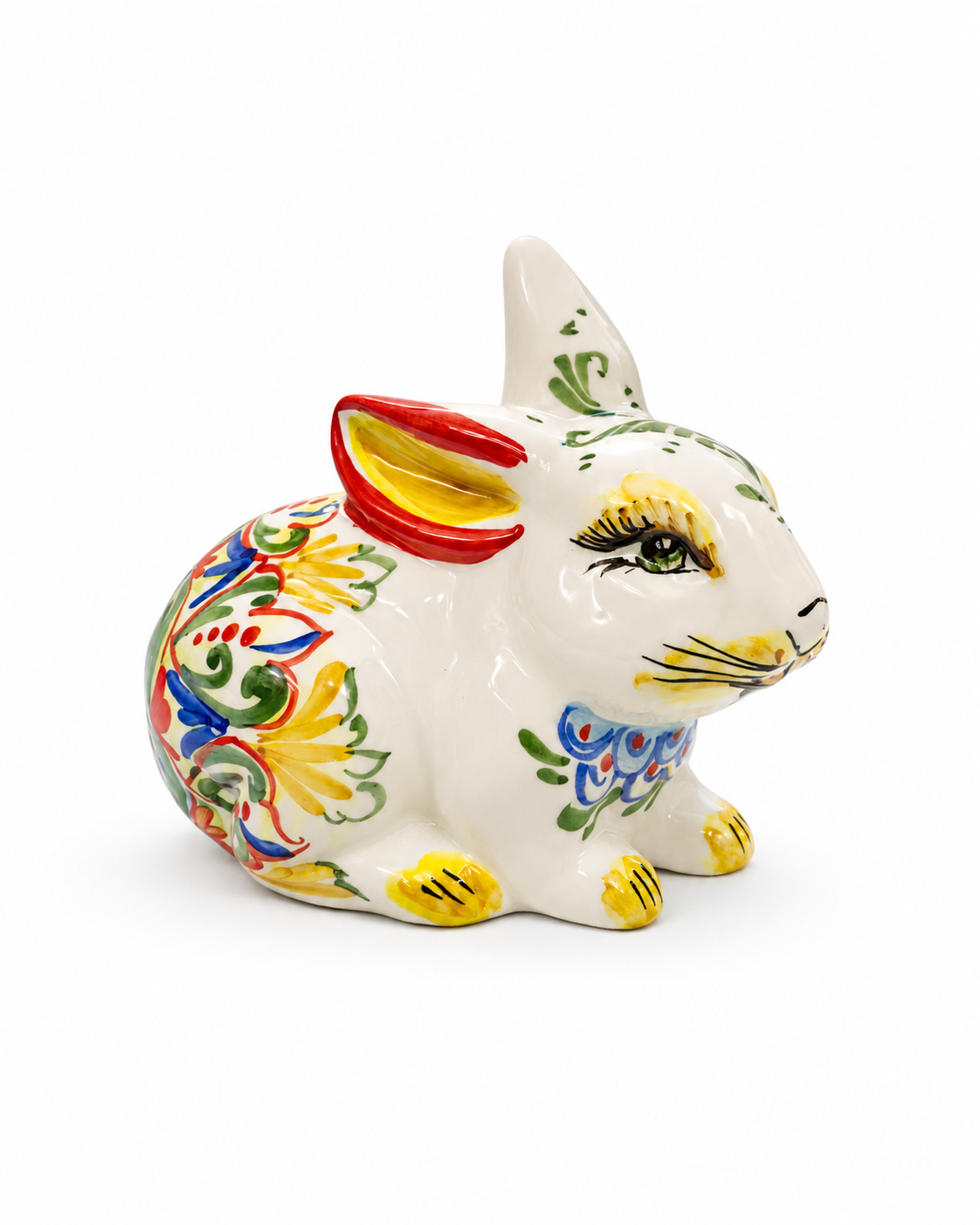 Hand-painted Sicilian ceramic rabbit sculpture with floral motifs
Italian artisan ceramic bunny decorative object
Mediterranean ceramic rabbit handcrafted in Sicily
