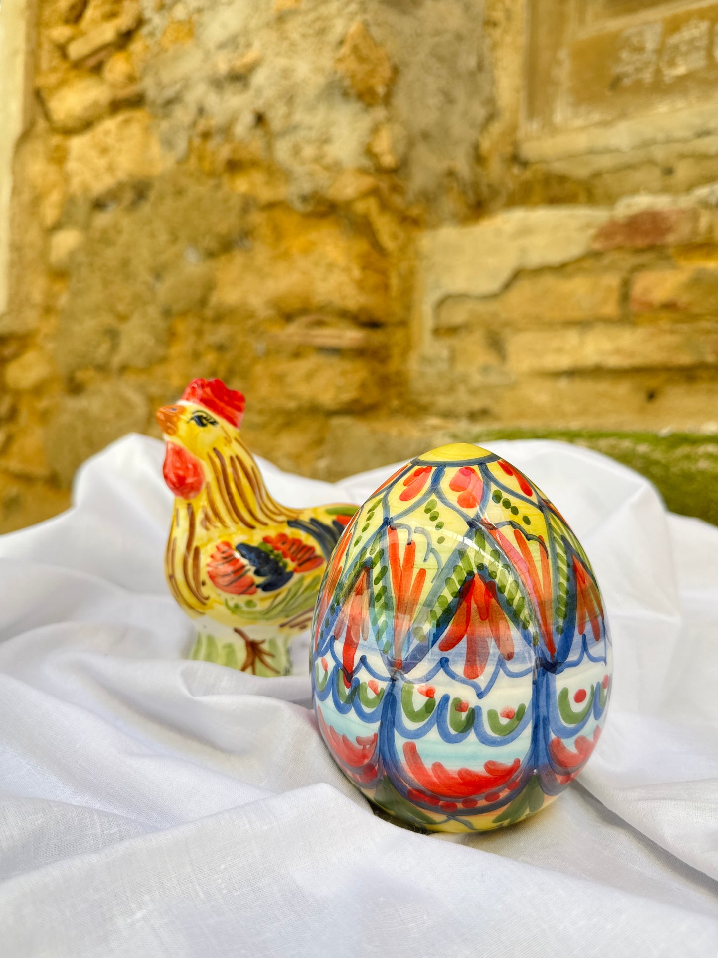 Hand-painted Sicilian ceramic rooster and decorative egg
Mediterranean ceramic decorative duo handcrafted in Sicily
Italian artisan ceramic folk composition with colorful motifs