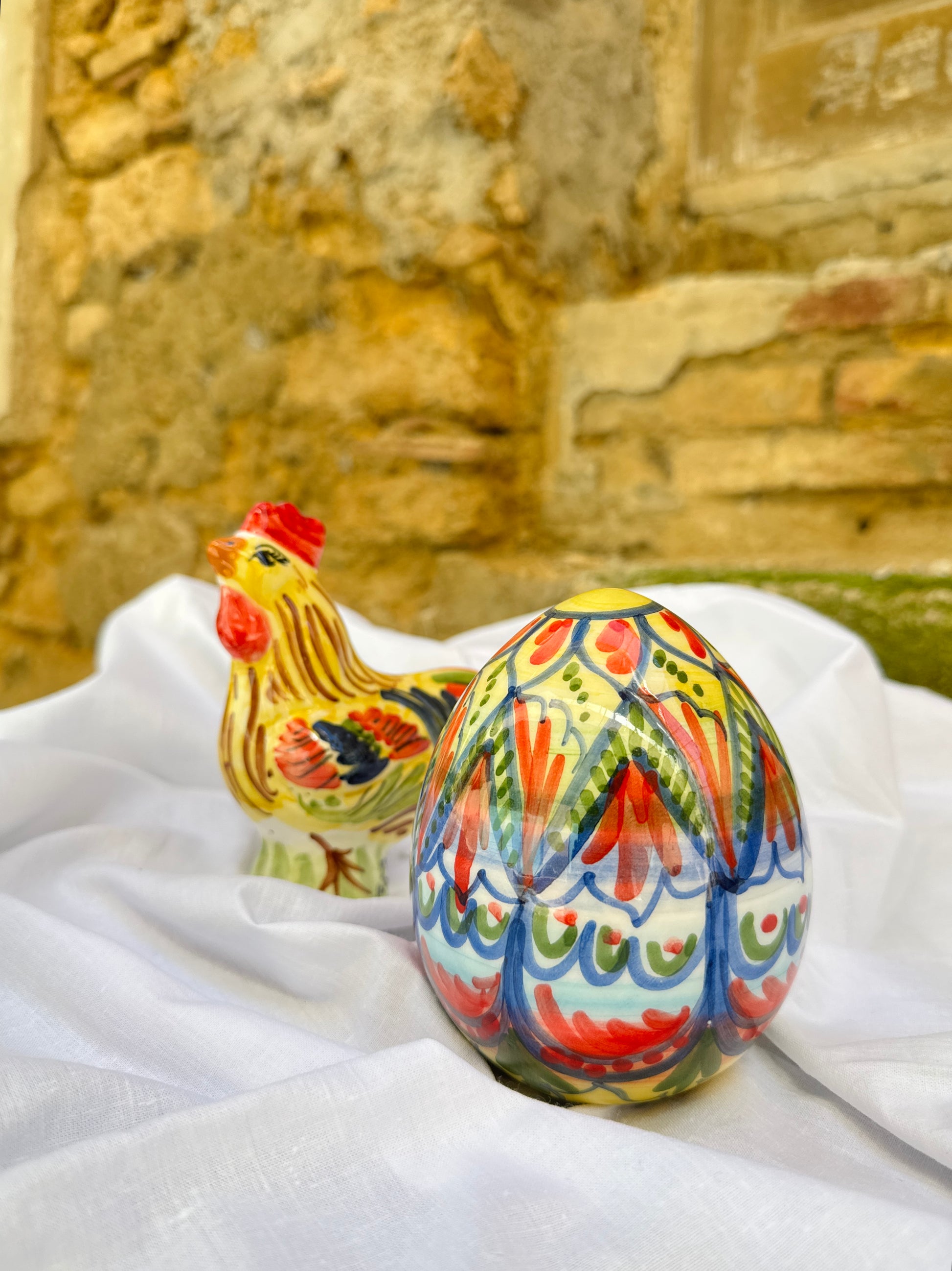 Hand-painted Sicilian ceramic rooster and decorative egg
Mediterranean ceramic decorative duo handcrafted in Sicily
Italian artisan ceramic folk composition with colorful motifs