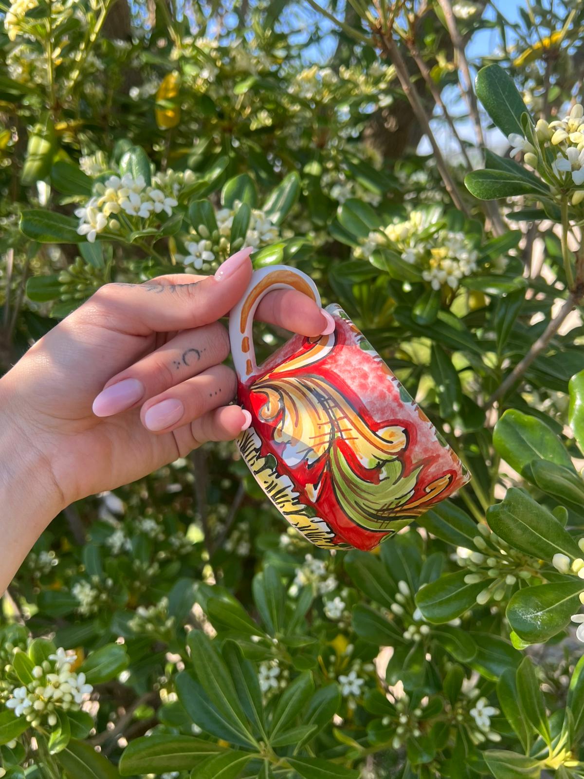 Hand-painted Sicilian ceramic espresso cup in coral red
Mediterranean artisan espresso cup handcrafted in Sicily
Italian ceramic coffee cup with baroque Mediterranean motifs