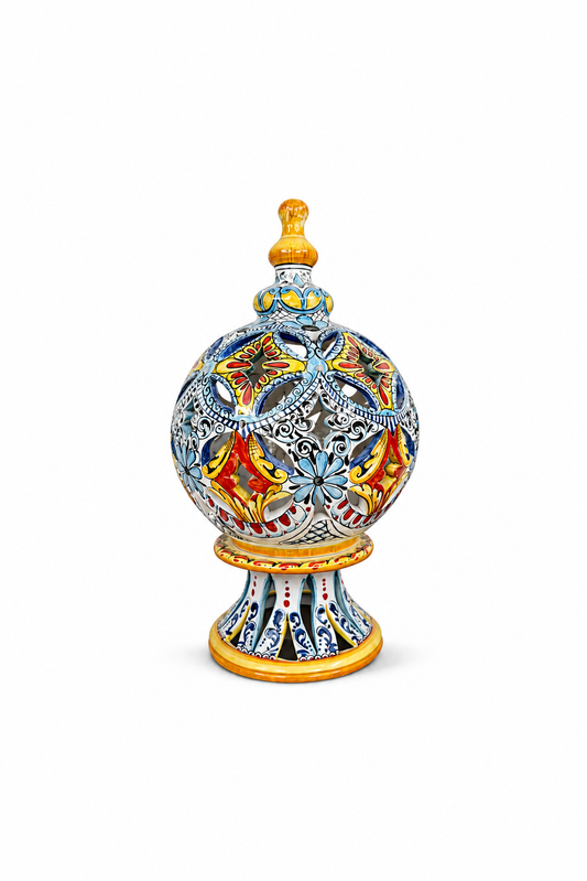 Hand-painted Sicilian ceramic lantern with baroque motifs
Mediterranean ceramic candle lantern handcrafted in Sicily
Italian artisan ceramic decorative lantern with pierced detailing