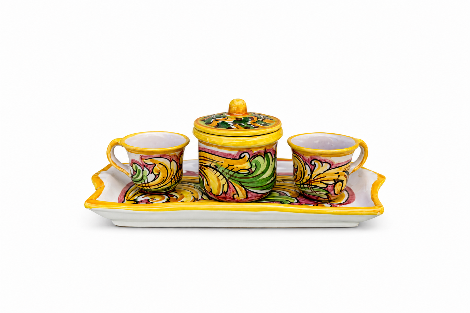 Colorful ceramic set with two cups and a lid on a white background