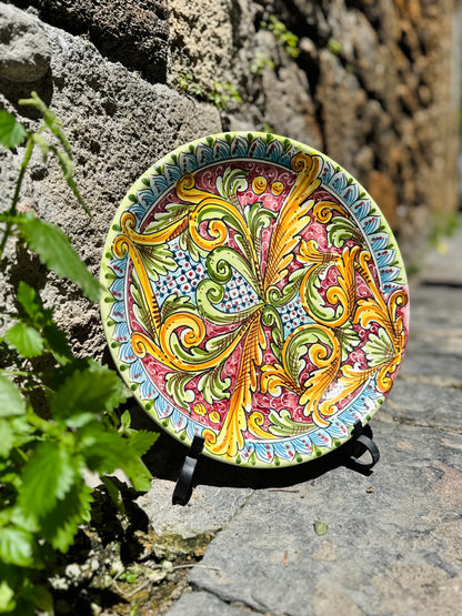 Hand-painted Sicilian ceramic centerpiece with baroque motifs
Mediterranean ceramic decorative centerpiece handcrafted in Sicily
Italian artisan ceramic centerpiece in red, green and gold