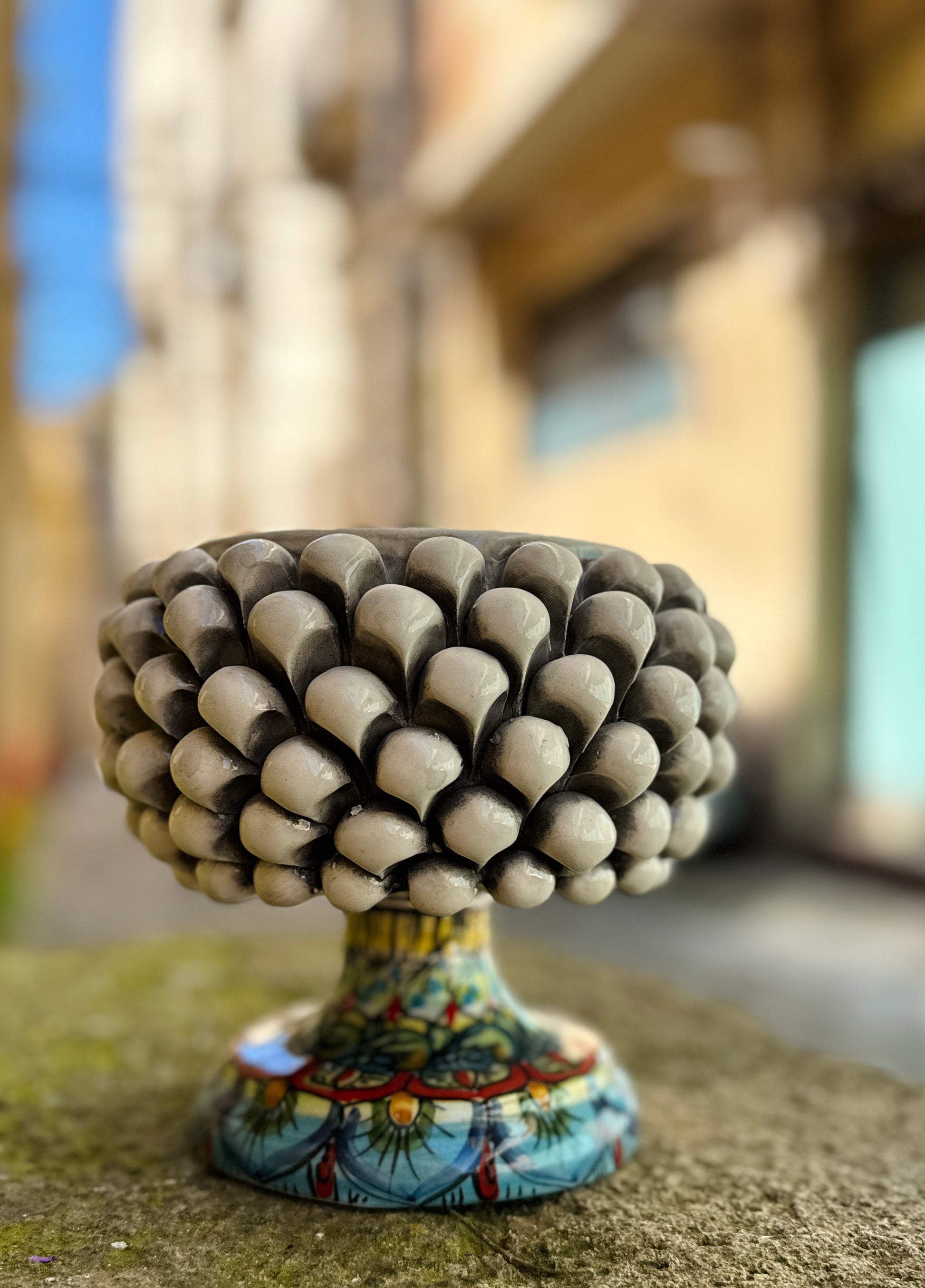 Handcrafted Sicilian ceramic pigna centerpiece bowl
Sculptural Mediterranean ceramic bowl with pine cone texture
Italian artisan ceramic centerpiece inspired by Sicilian pigna
