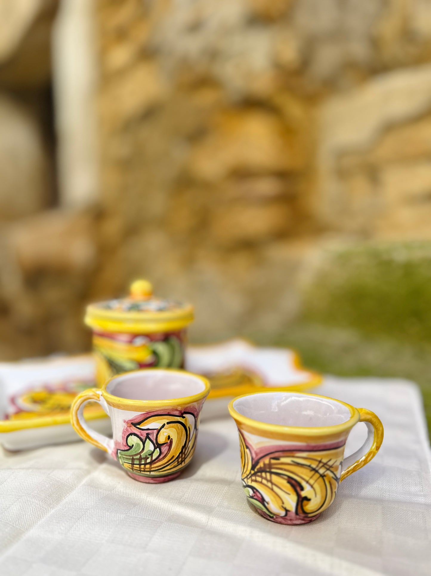 Hand-painted Sicilian ceramic espresso set with tray and sugar jar
Mediterranean ceramic coffee set handcrafted in Sicily
Italian artisan espresso cups with decorative serving tray