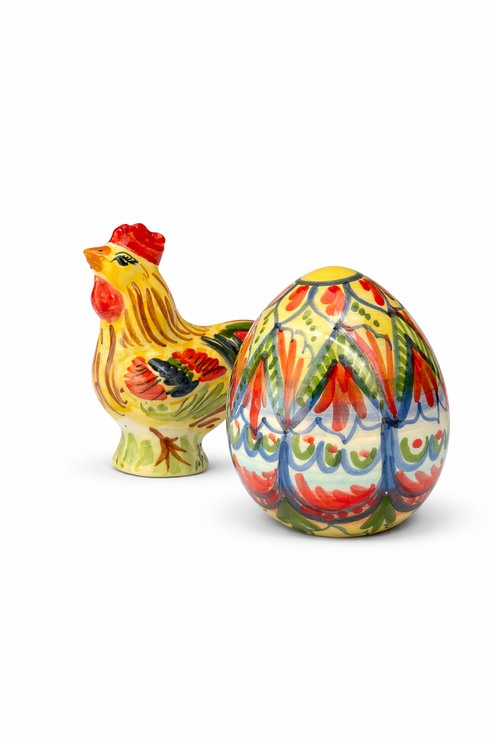 Colorful ceramic chicken and egg on a white background