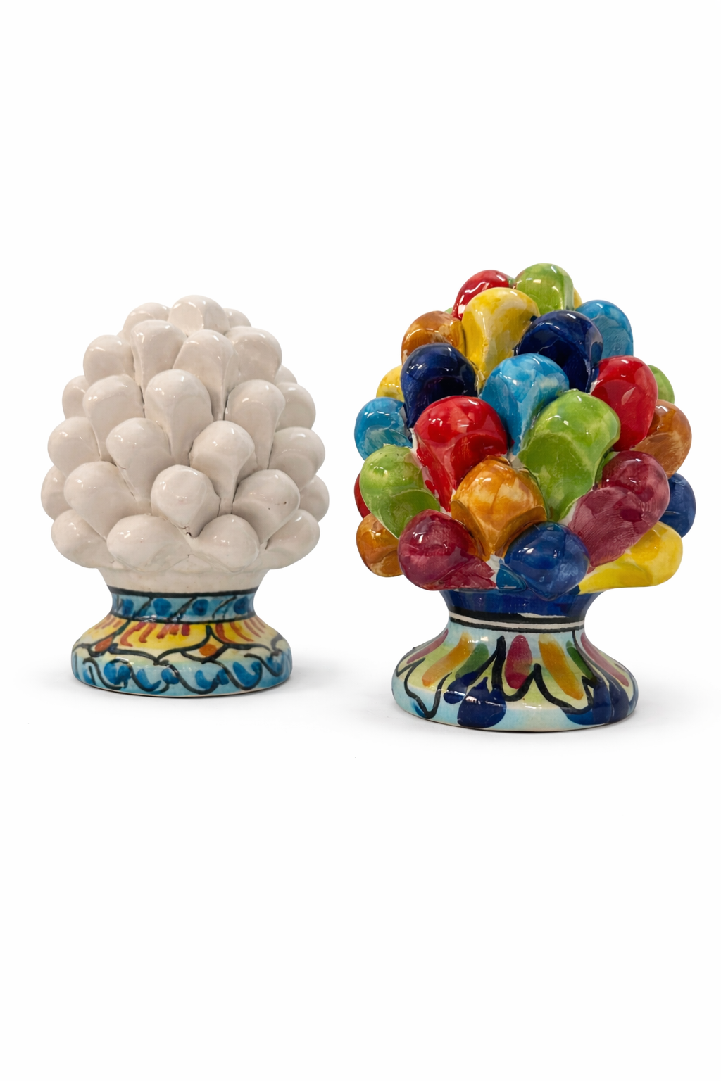 Two ceramic items, one white and one multicolored, on a white background