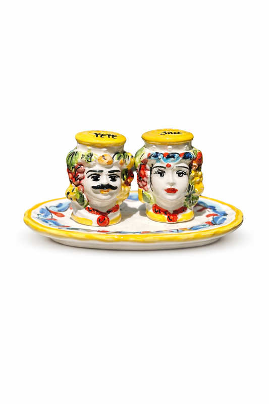 Handcrafted Sicilian Teste di Moro salt and pepper set
Mediterranean ceramic tableware inspired by Sicilian Moro Heads
Italian artisan ceramic salt and pepper set with decorative tray