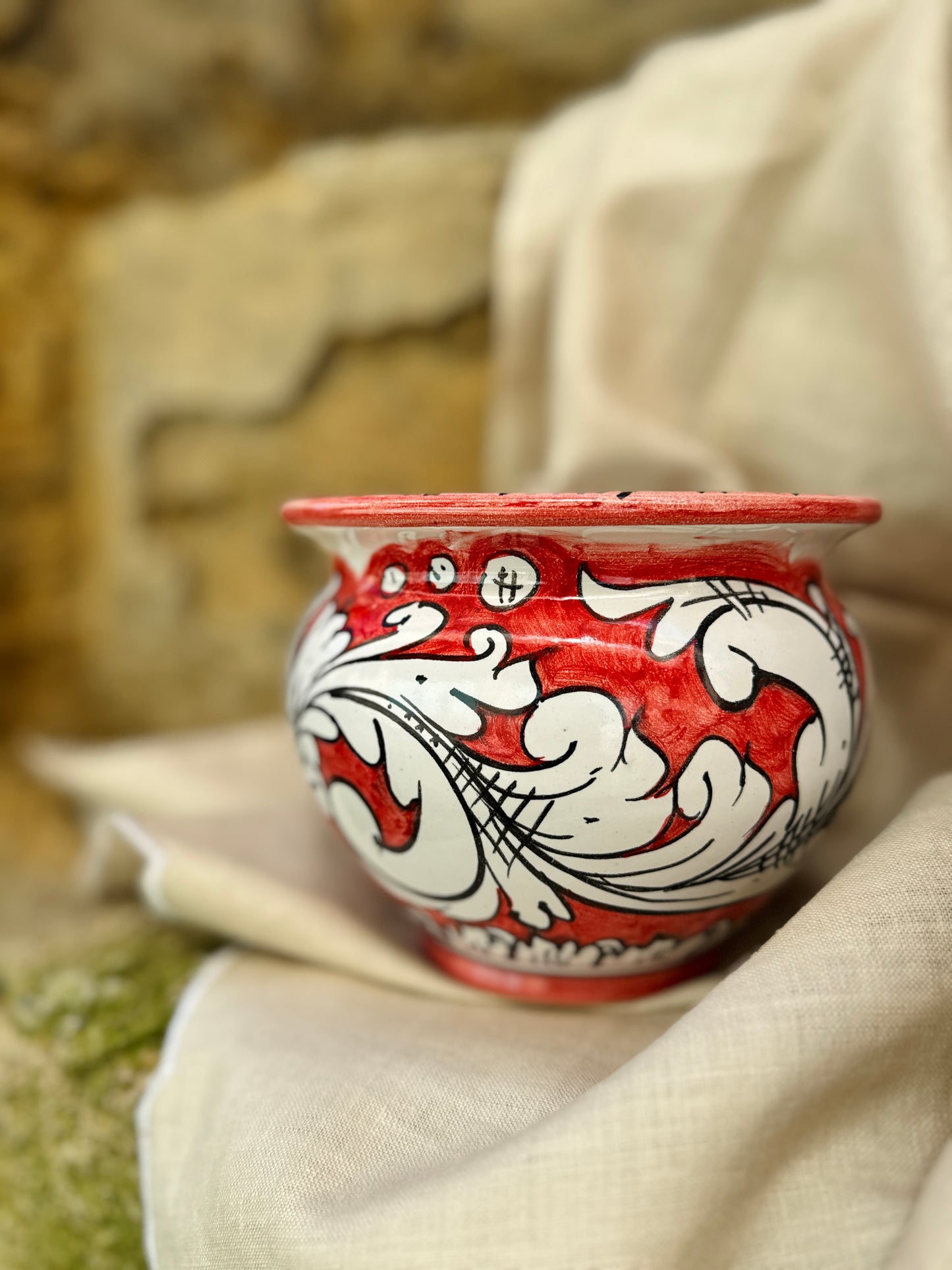Hand-painted Sicilian ceramic cachepot in turquoise blue and yellow
Mediterranean ceramic planter handcrafted in Sicily
Italian artisan ceramic vessel with baroque motifs