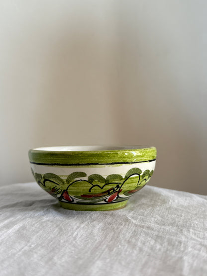 Hand-painted in Sicily, this ceramic bowl combines traditional Mediterranean patterns with timeless artisanal craftsmanship.