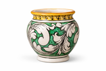 Hand-painted Sicilian ceramic cachepot in cobalt blue and white
Mediterranean ceramic planter handcrafted in Sicily
Italian artisan ceramic vessel with baroque motifs