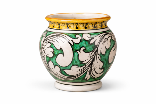 Hand-painted Sicilian ceramic cachepot in cobalt blue and white
Mediterranean ceramic planter handcrafted in Sicily
Italian artisan ceramic vessel with baroque motifs