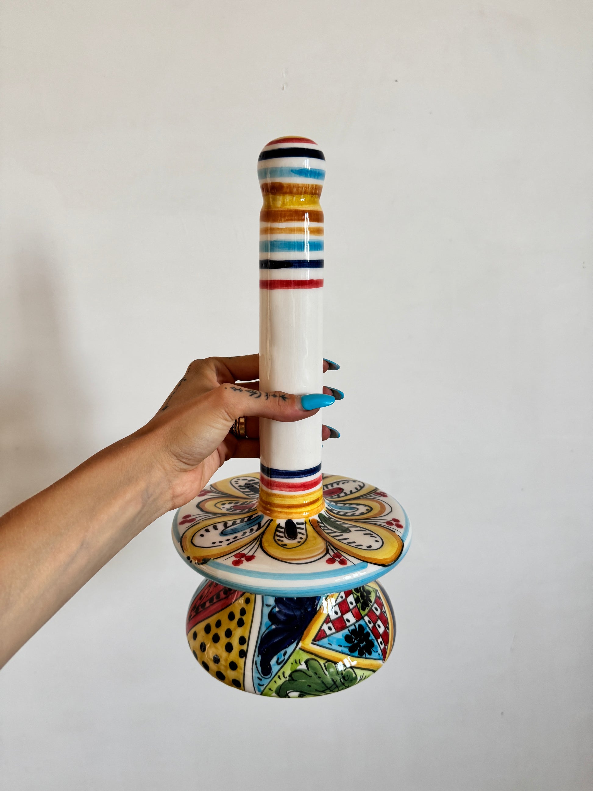 Decorative Sicilian ceramic kitchen accessory handmade in Caltagirone and inspired by centuries-old Mediterranean artistic traditions.